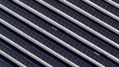 Top-down drone forward flyover above rooftop photovoltaic arrays in the Po Stock-Footage 342291002