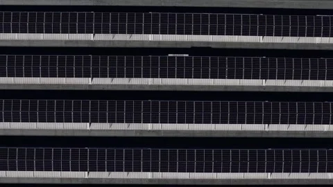 Top-down drone forward flyover above rooftop photovoltaic arrays in the Po Stock-Footage 342292083