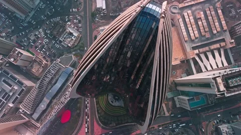 Top-Down Drone of Iconic Ribbed Skyscraper, Kuwait City—Teardrop Facade over Stock Footage 324899395