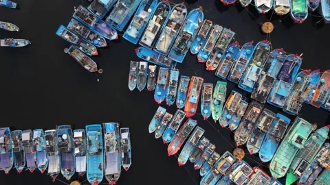 Top down drone orbit of colorful fishing boats in Da Nang, Vietnam 動画素材 340874444