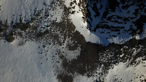 Top down drone over Ben Nevis plateau and shadowed North Face in winter Video stock 330577214