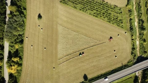 Top-Down Drone over Field with Tractors and Hay Bales near Verona, Italy Stock Footage 316761069
