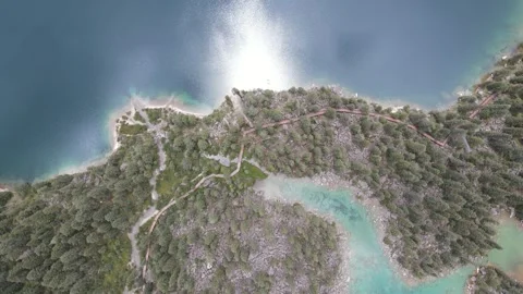 Top Down Drone Over Forest Island Lake in Cuopu Valley Sichuan China Video stock 330279871