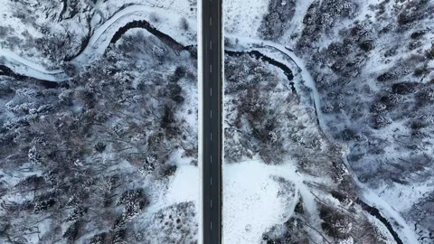 Top Down Drone Over Snowy Bridge Above Alpine Gorge 스톡 동영상 329557805