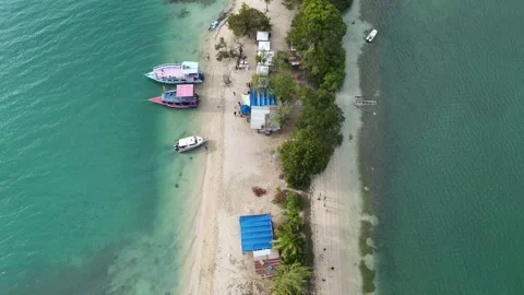 Top down drone perspective of the No Man's Land sandbar and tour boats Tobago Stock Footage 336360534