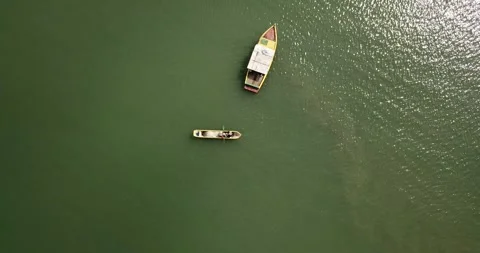 Top-Down Drone Reveal Up Over Boats in Paraty Bay (Ilha do Araújo) Stock Footage 320634911