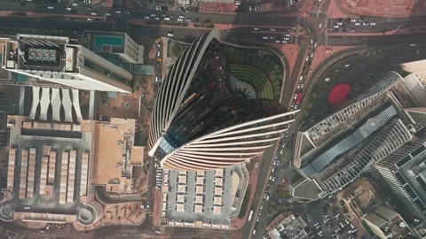 Top-Down Drone of Ribbed Skyscraper, Kuwait City—Glass Fins, Atrium Rings Stock Footage 324895400