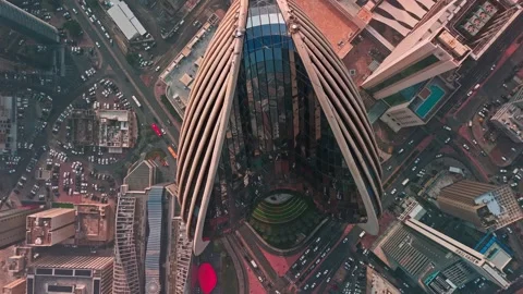 Top-Down Drone of Ribbed Skyscraper, Kuwait City—Glass Atrium and Symmetric Stock-Footage 324950936