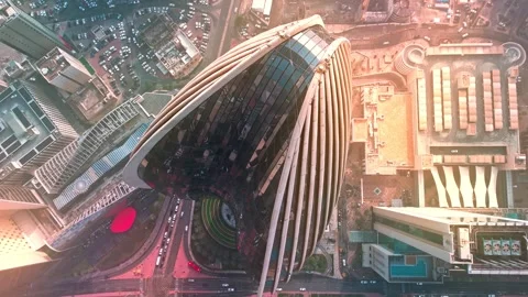 Top-Down Drone of Ribbed Skyscraper, Kuwait City—Sunlit Fins, Glass Crown Stock Footage 324950975