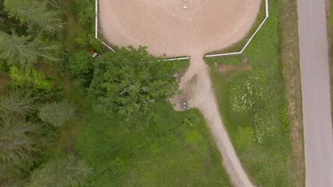 Top-down drone riding arena path forest Sweden Stock Footage 346465496