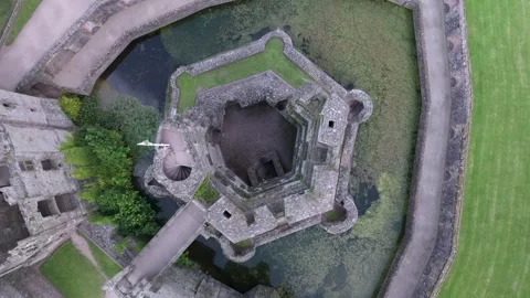 Top down drone rise over castle tower in Raglan, Wales 動画素材 277394411
