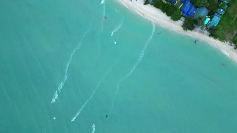 Top-Down Drone Rotation Around Kitesurfers on Blue Ocean Water, Koh Phangan Stock-Footage 339402040