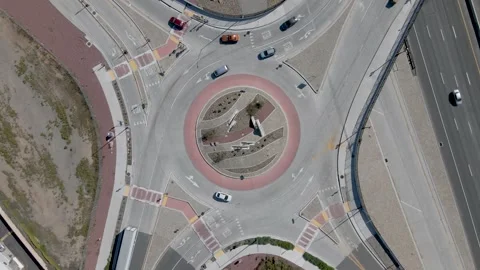 Top-down drone rotation over a busy roun... | Stock Video | Pond5