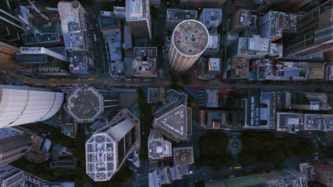 Top down drone shot above skyscrapers in downtown Sydney, sunrise in Australia Video stock 324939817