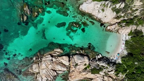 Top - down drone shot of a beach in Sardinia Stock Footage 260611158