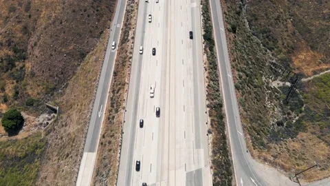 Top down Drone shot of the California desert highway Stock Footage 135701706