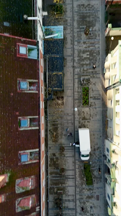 Top-Down Drone Shot of City Street Over Bridge in Nyköping, Sweden – Vertical Stock Footage 320903917