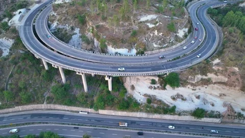 Top-down drone shot of curved highway infrastructure in Jammu. Stock Footage 335644289
