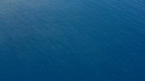 Top-Down Drone Shot of Deep Blue Ocean Texture – No Horizon Stock Footage 317646997