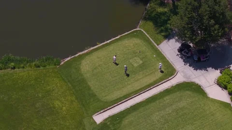 Top-down drone shot of female golfers teeing off at Hillcrest Country Club Stock Footage 339503658