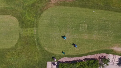 Top-down drone shot of golfers playing on a fairway at Hillcrest Country Club Stock Footage 339503593