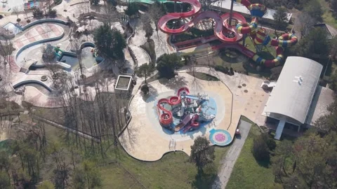 Top Down Drone Shot Of Large Colorful Aquapark Water Slides Video stock 330131562