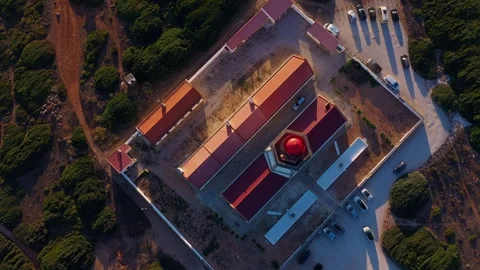 Top down drone shot of lighthouse, cape Espichel at sunset, Portugal Stock Footage 255387169