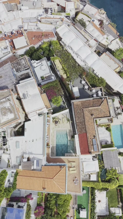 Top Down Drone Shot of Luxury Rooftops in Positano Italy Vertical Vidéo 334683198