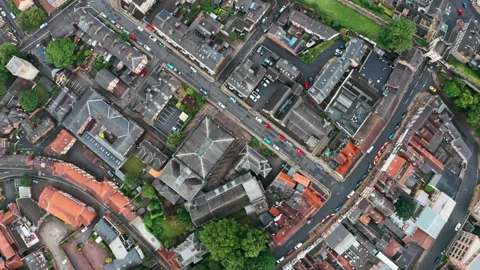Top down drone shot over York city centre west and City Wall Stock Footage 157289029