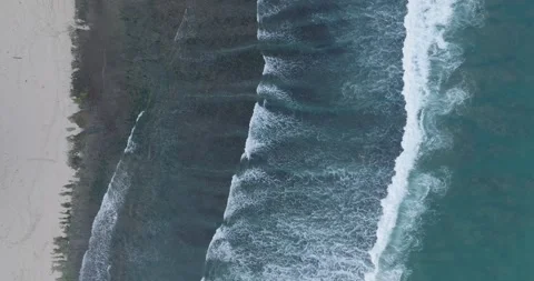 Top down drone shot over tropical Balangan Beach peninsula in Uluwatu Bali Stock Footage 268340058