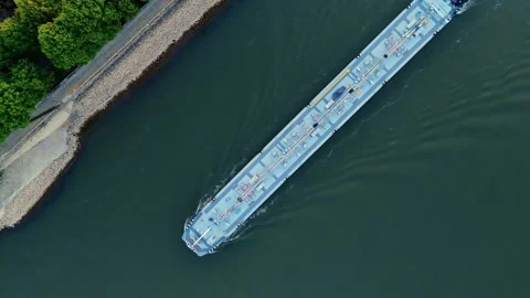Top Down Drone Shot Over Cargo Ship and Tourist Boat on Rhine River in Cologne Stock Footage 312527522