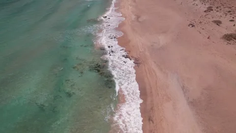 Top Down Drone Shot of Playa Mallorquines with Parasailer Below, Fu Stock Footage 309021696