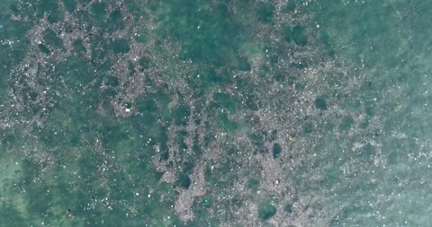 Top down drone shot of sewage water in ocean, Bali Indonesia Stock Footage 267515348