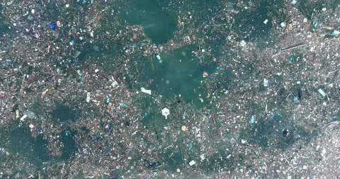 Top down drone shot of sewage water in ocean, Bali Indonesia Stock Footage 267515356