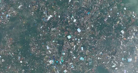 Top down drone shot of sewage water in ocean, Bali Indonesia Stock Footage 267515610
