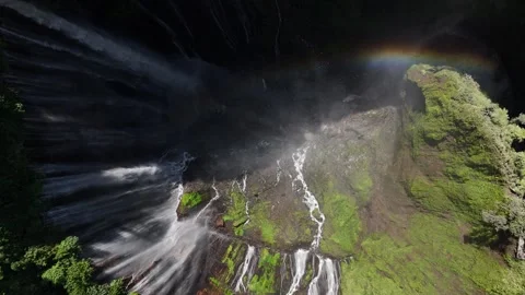Top Down Drone Shot of Tumpak Sewu Waterfall and Cliff Amphitheater Stock Footage 329628293