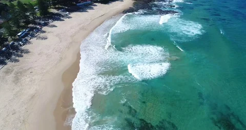Top Down Drone Shot Waves Crushing against the rocks Stock Footage 115759083