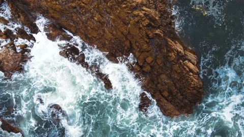 Top Down Drone Shot of Waves Crashing Rocky Cliffs Stock-Footage 232027126