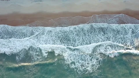 Top-down drone shot of waves at Pipa Beach, Rio Grande do Norte. Stock Footage 314401498