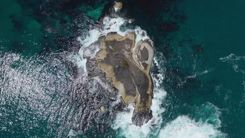 Top Down Drone Shot of Waves Breaking Over Coastal Rock in Atlantic Ocean Stock Footage 330318391