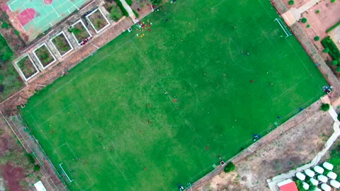 Top-down drone spinning over football stadium, Youssoupha Ndiaye, Senegal Stock Footage 331989584
