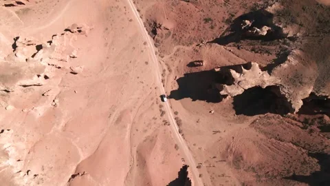 Top-Down Drone Tracking Shot of Car Driving Through Charyn Canyon, Kazakhstan Stock Footage 313093335