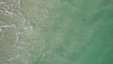 Top down drone video of sea foam and green water. The Concept of nature. Stock-Footage 332600183