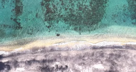 Top Down Drone View of Black Sand Beach and Coral Reef in Amed Bali Stock Footage 334371859