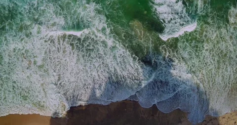Top Down Drone View of Blue Ocean Waves Moving Over Tropical Water Video stock 331188720