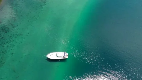 Top-Down Drone View Of Boat On Lake In New Zealand, Drone Panning Right Stock Footage 145720996