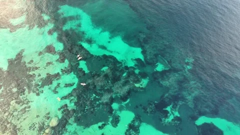 Top-Down Drone View of Boats Floating on Clear Waters at La Marmorata, Vídeo Stock 332606716