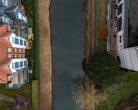 Top down drone view of buildings alongside the river Stort in Bishops Stortford Stock Photos