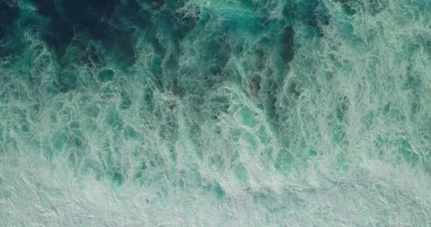 Top Down Drone View of Calm Ocean Waves Creating Smooth Texture 스톡 동영상 330591337