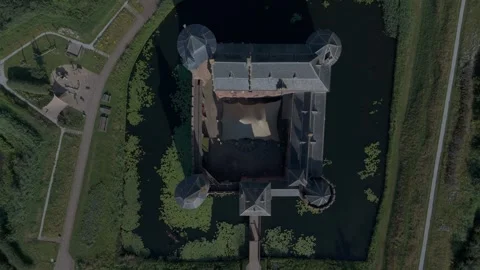 Top Down Drone View of Castle Surrounded by Moat Stock Footage 339684395